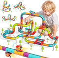 Electric train running on a colorful cube block track layout
