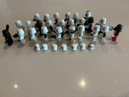 Lego Star Wars Stormtroopers and clone lot of 25 Minifigures Helmets & Blasters