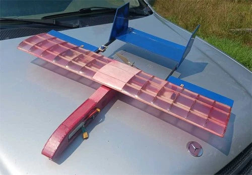 Twin Boom Pusher 34" wingspan RC plane kit. Sports flyer, with covering.