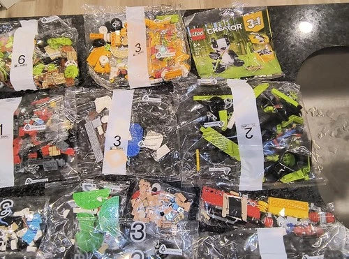MEOW Lot of 57 Random Sealed Poly Bags From Unknown Sets 5 Pounds Worth