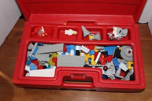 Vintage Lego Red Carrying Case w/ Legos included spaceman/astronaut, vehicles