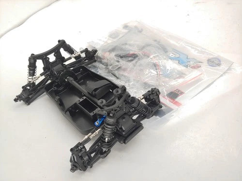 Team Associated Reflex 14T 1/14 Mini Truggy Roller Slider Chassis NEW