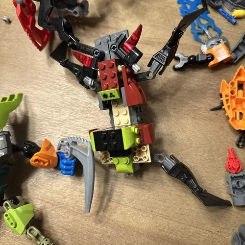 Lot Of MEOW Bionicle Technic and/or Hero Factory Pieces Parts W/ Masks Weapons