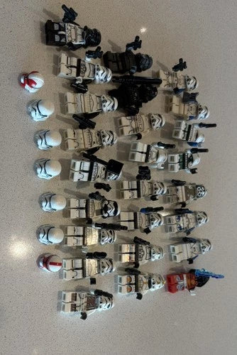 Lego Star Wars Stormtroopers and clone lot of 25 Minifigures Helmets & Blasters