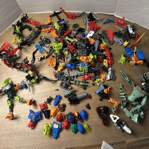 Lot Of MEOW Bionicle Technic and/or Hero Factory Pieces Parts W/ Masks Weapons