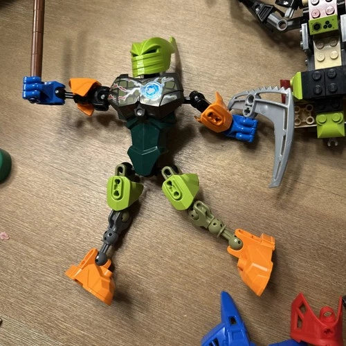 Lot Of MEOW Bionicle Technic and/or Hero Factory Pieces Parts W/ Masks Weapons