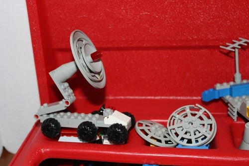Vintage Lego Red Carrying Case w/ Legos included spaceman/astronaut, vehicles
