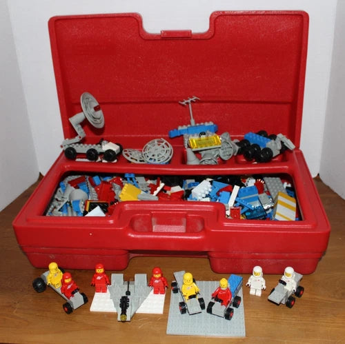 Vintage Lego Red Carrying Case w/ Legos included spaceman/astronaut, vehicles